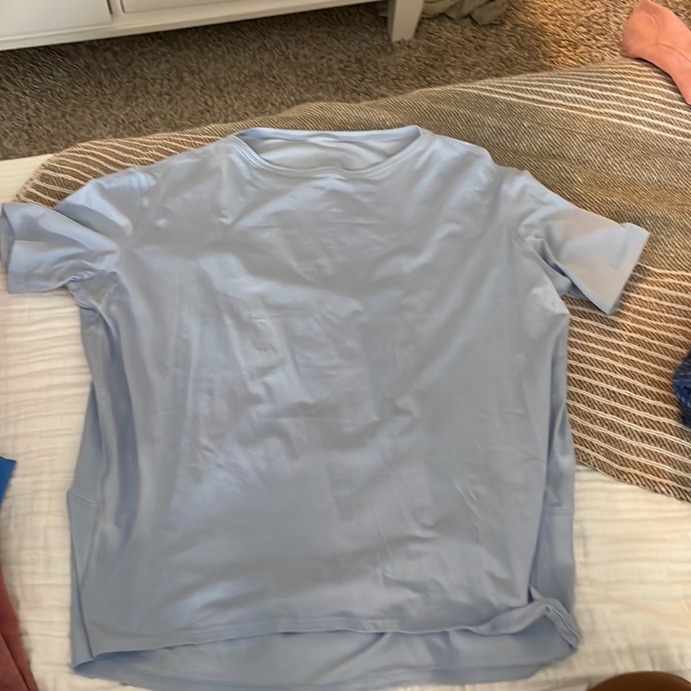 Lululmeon blue linen back in action t shirt